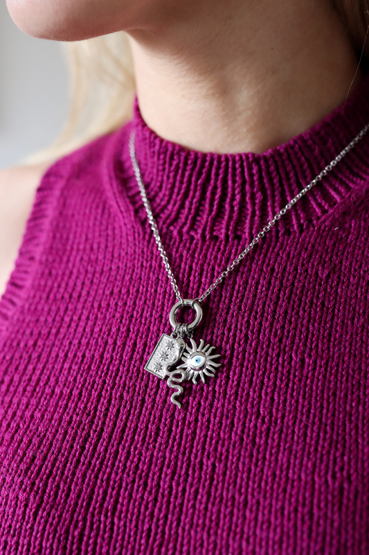 Un-told smykke sølvfarget