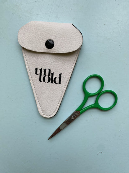 Un-told saks med etui