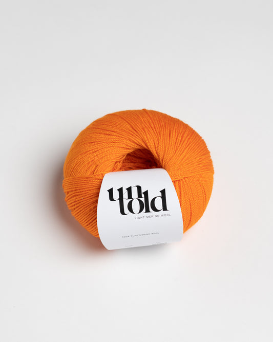 Ufortalt lett merino - Orange Pop